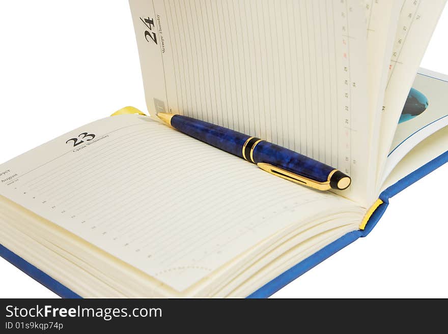 Opened diary with pen inside