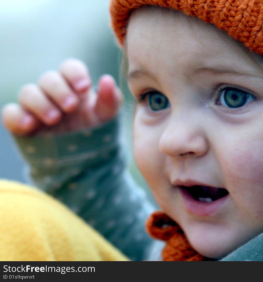 Adorable 14 month old staring into the winter day. Adorable 14 month old staring into the winter day