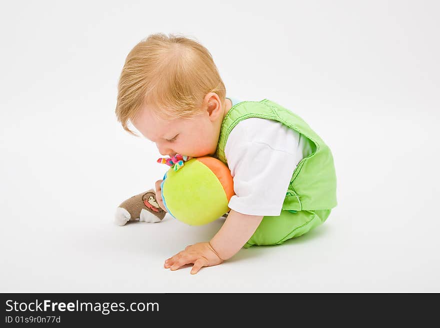 Little baby boy in green a pair of trousers