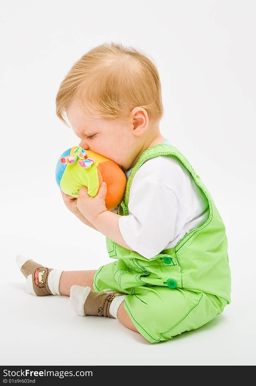 Little baby boy in green a pair of trousers