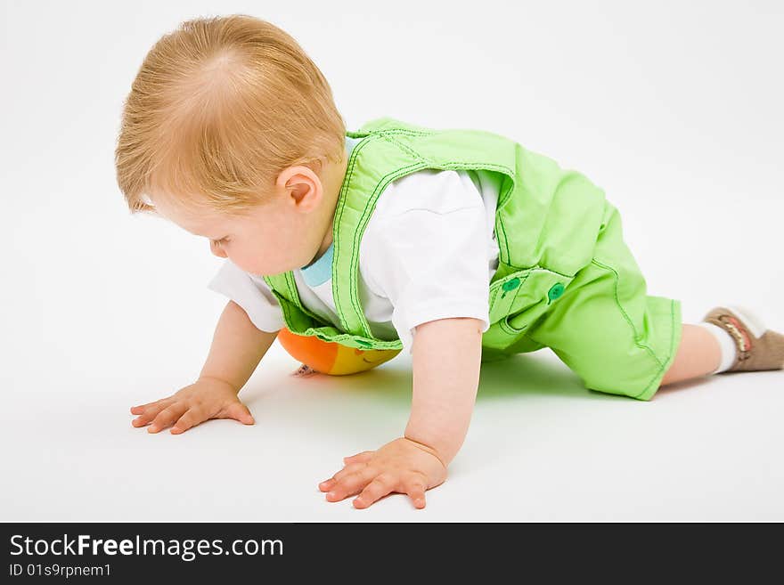 Little baby boy in green a pair of trousers