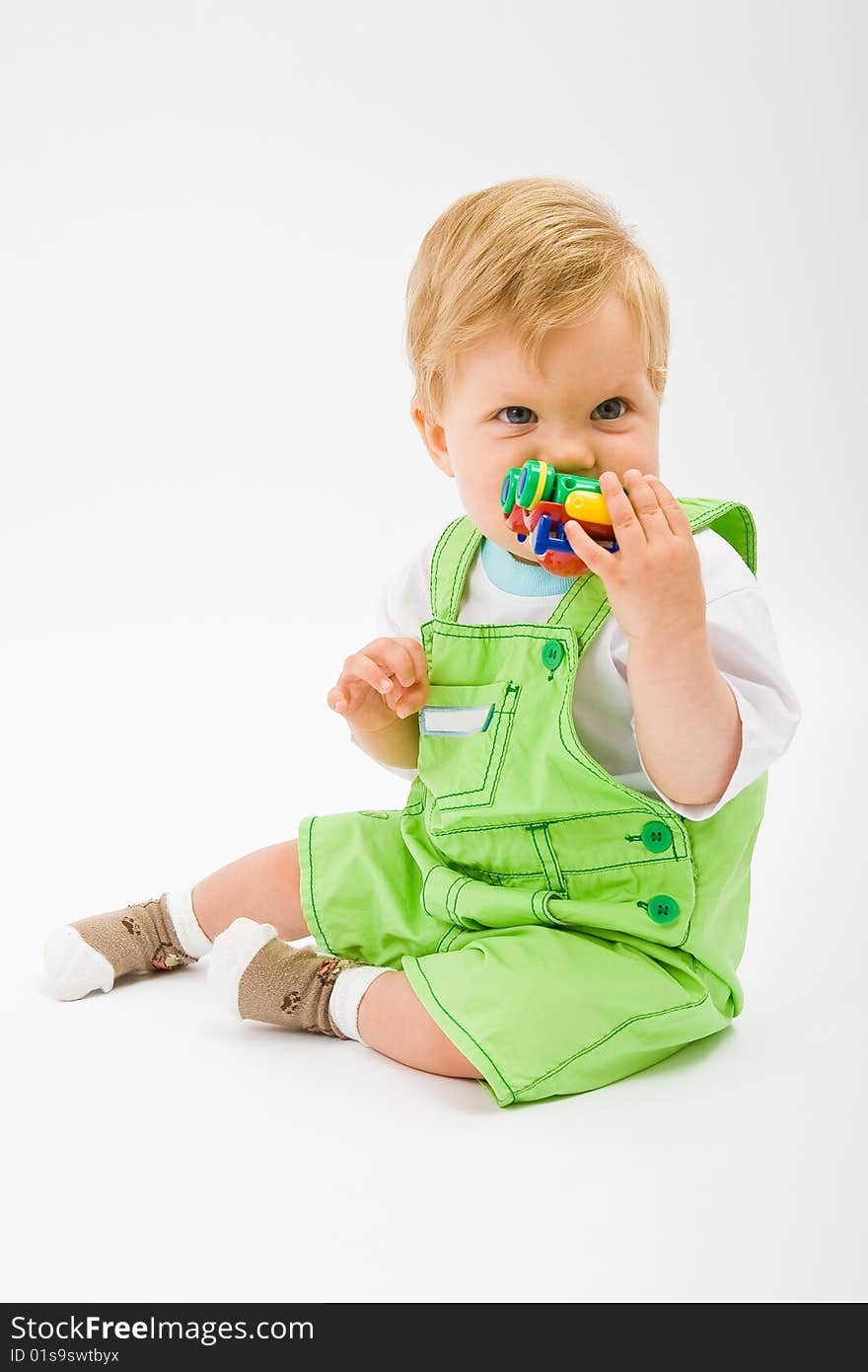 Little baby boy in green a pair of trousers