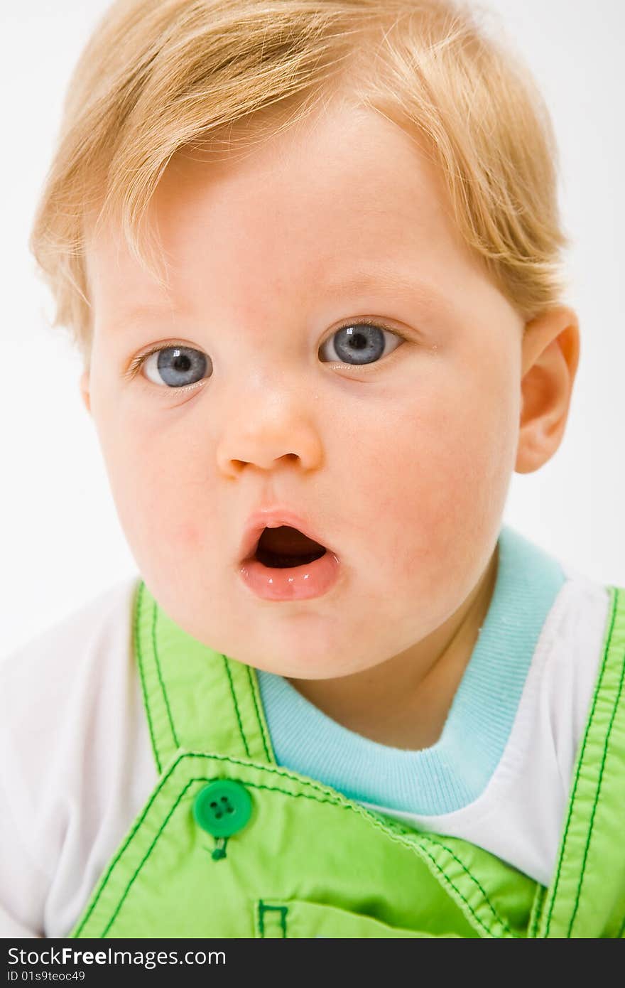 Little baby boy in green a pair of trousers