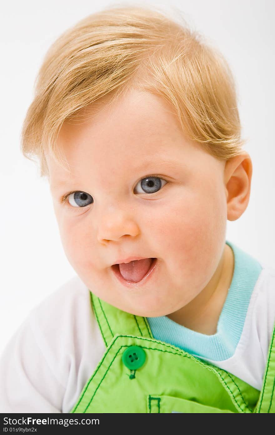 Little baby boy in green a pair of trousers