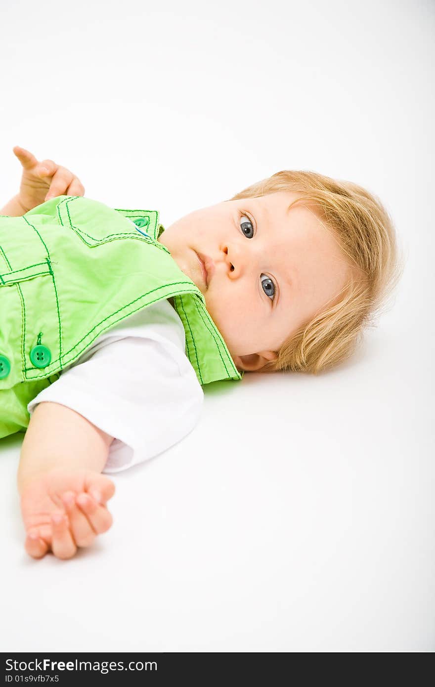 Little baby boy in green a pair of trousers