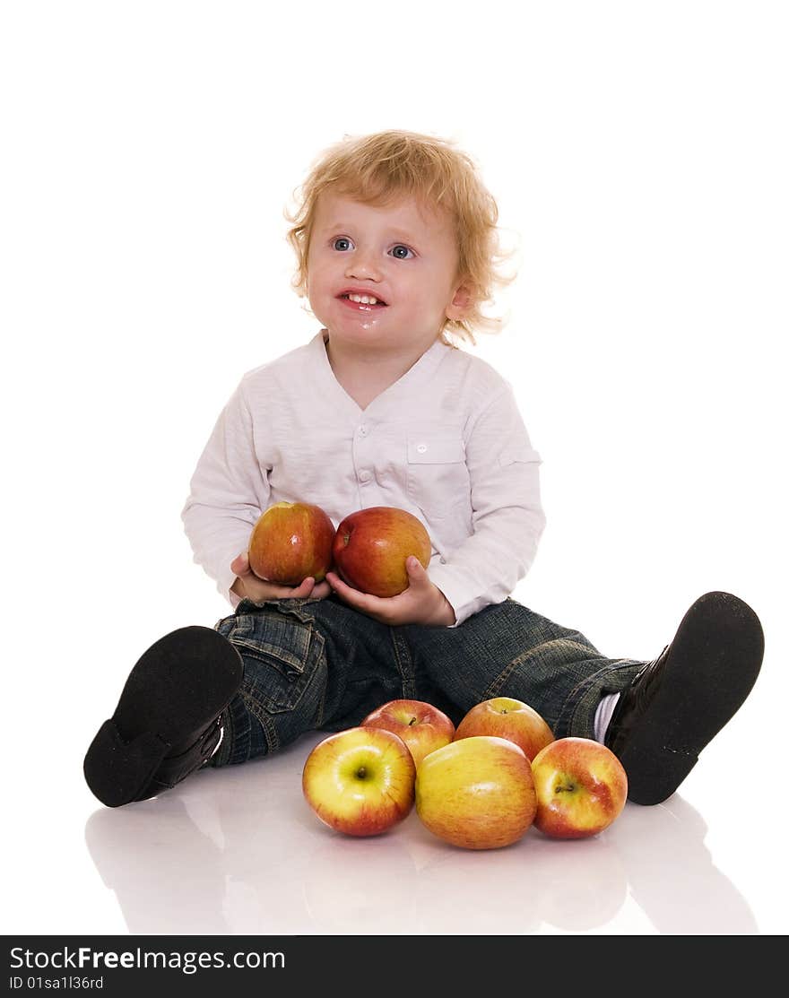 Baby with apple isolated on white. Baby with apple isolated on white.