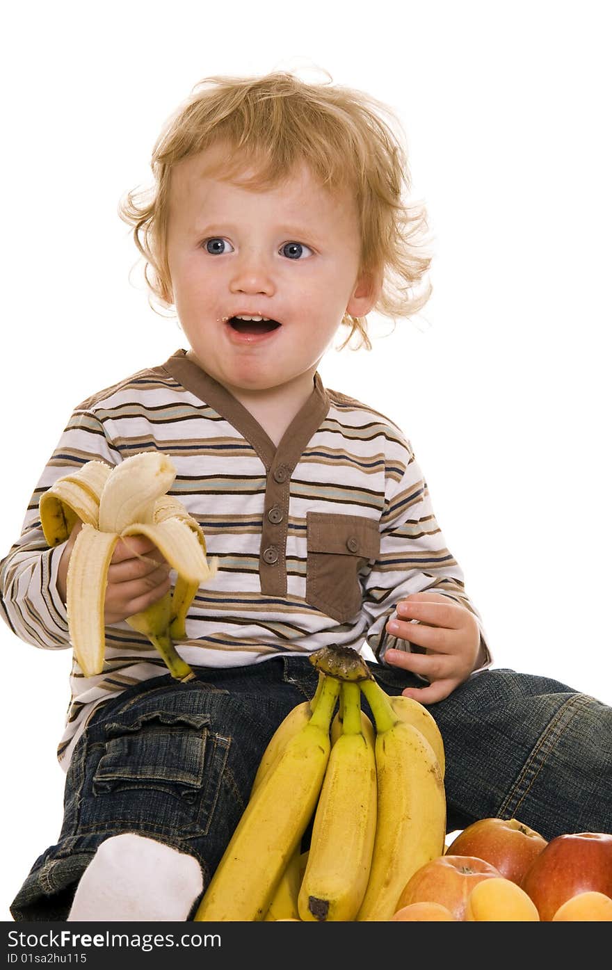 Baby with fruit isolated on white. Baby with fruit isolated on white.