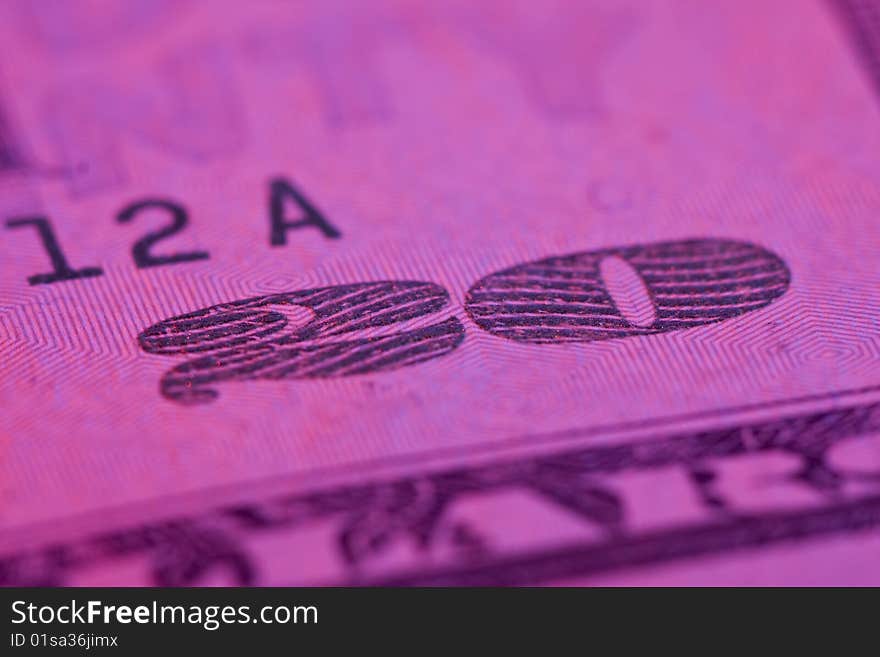 Macro 20 dollar bill with pink tint