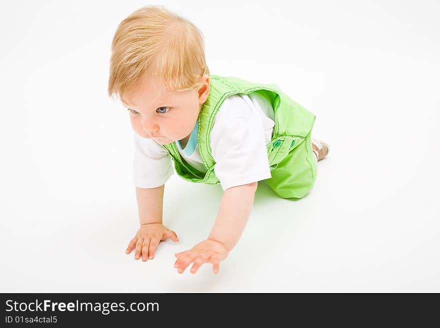 Little baby boy in green a pair of trousers