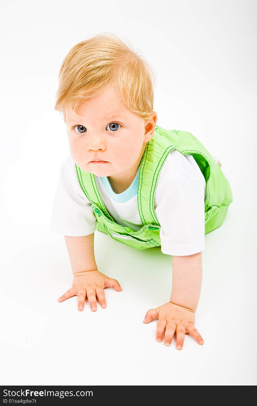 Little baby boy in green a pair of trousers