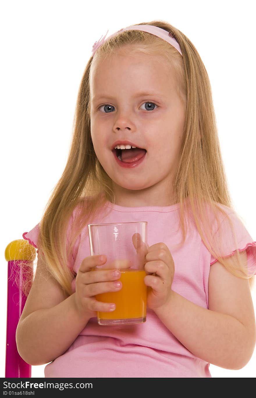 Little girl with glass of juice. Little girl with glass of juice.