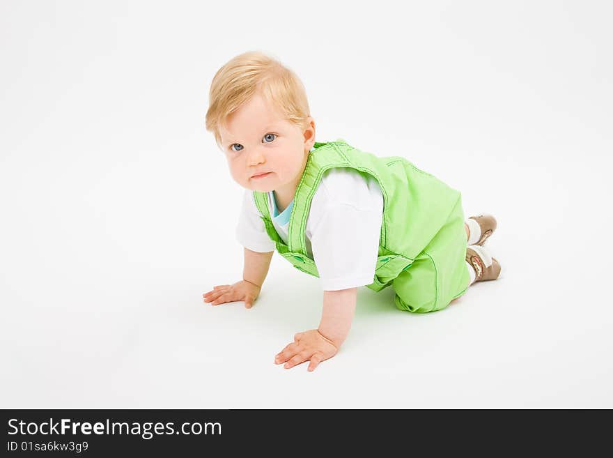 Little baby boy in green a pair of trousers