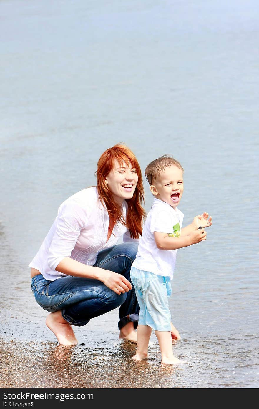 Mother and son on beach