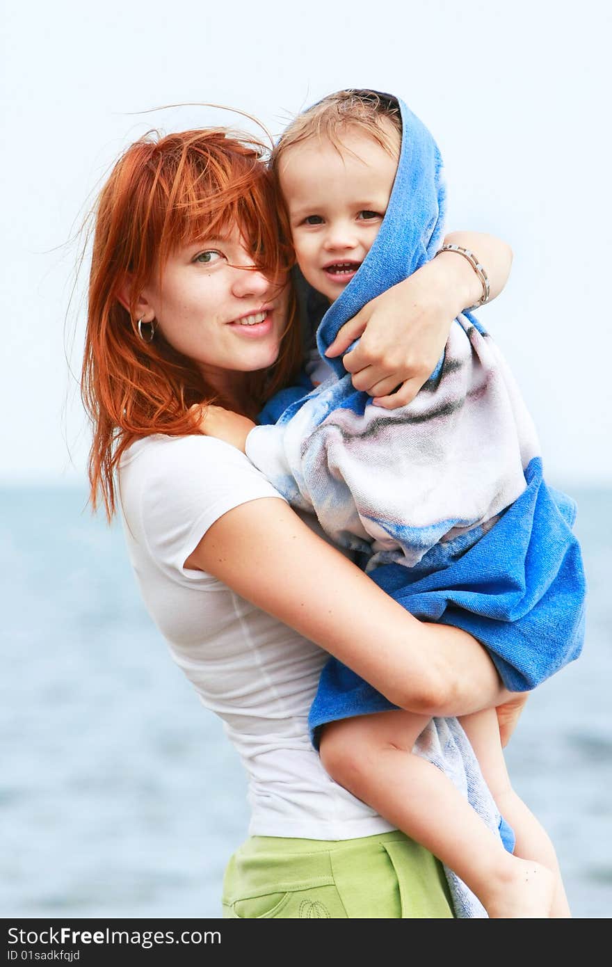 Mother And Son On Beach