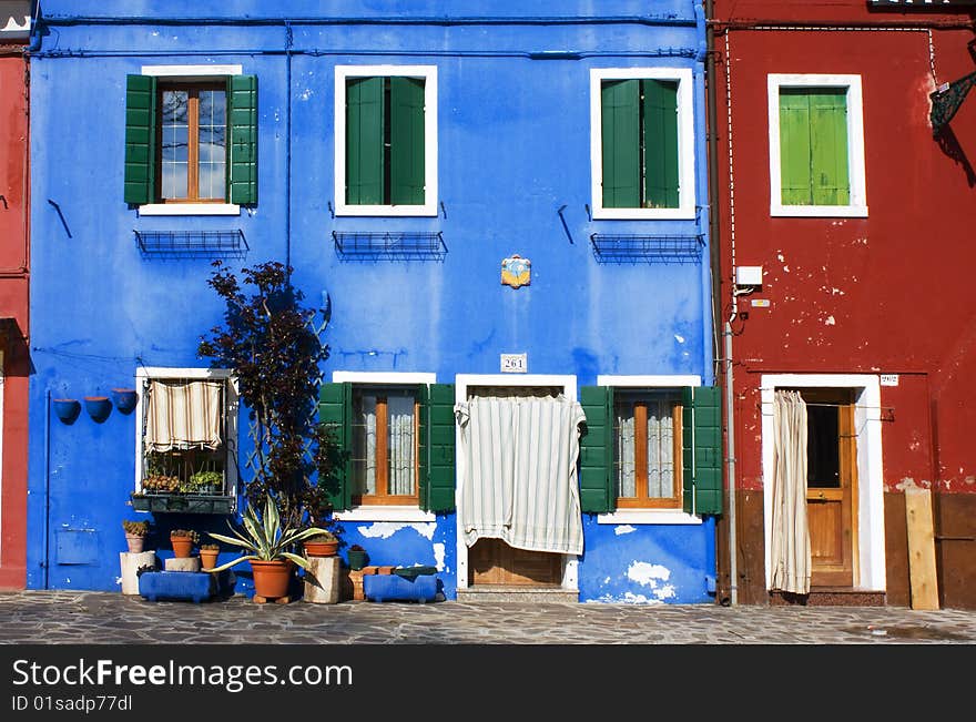 Street with houses painted in bright colors. Street with houses painted in bright colors