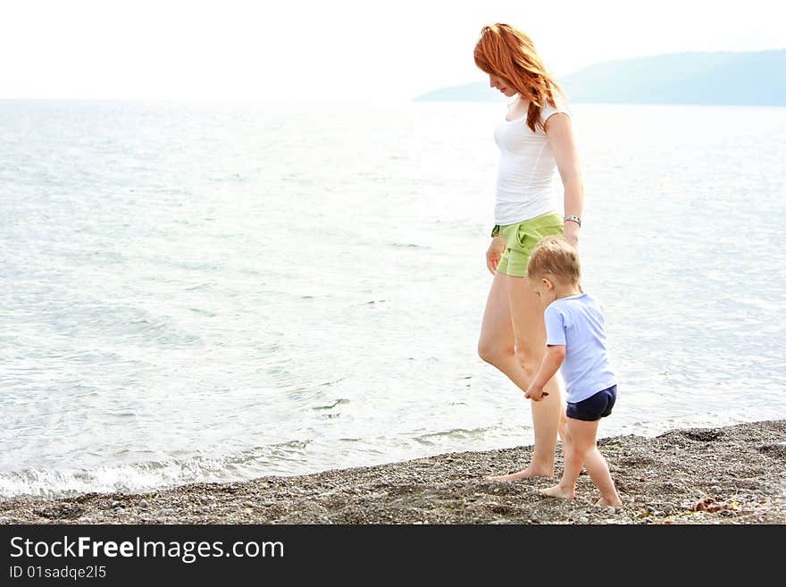 Mother And Son On Beach