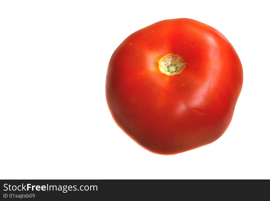 Single fresh red tomato, isolated on white