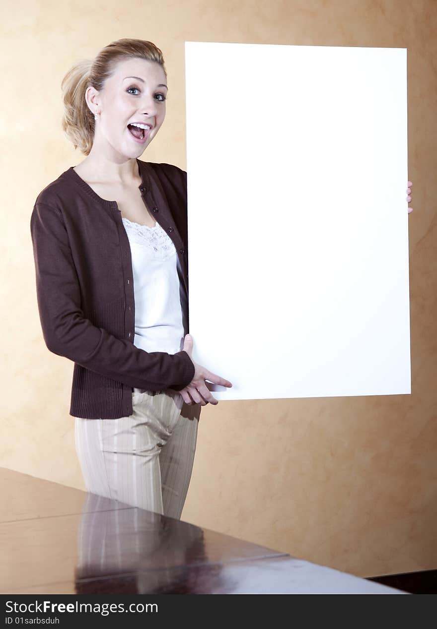 Young Caucasian Professional Lady Holding White Board. Young Caucasian Professional Lady Holding White Board