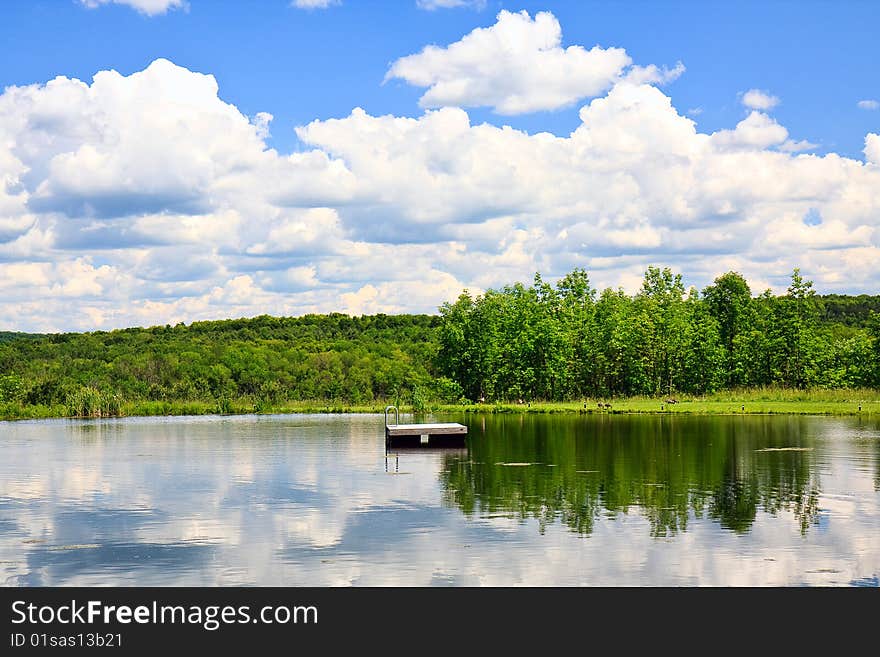 Pond and clouds