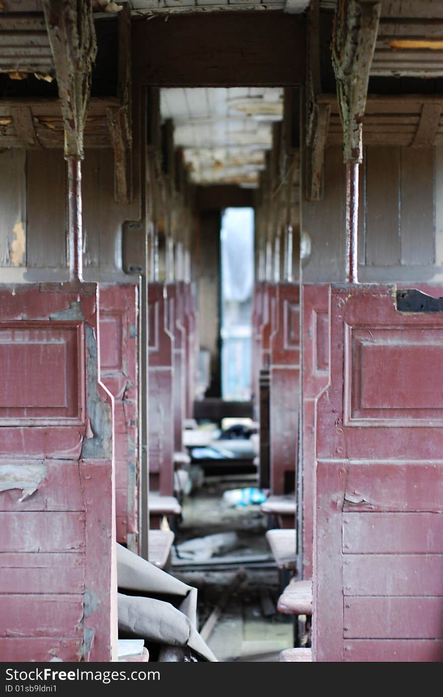 This is a very old train wagon. Founded in an old station.