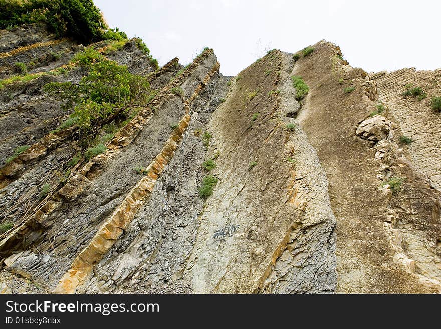 Rocky cliff and blue sky