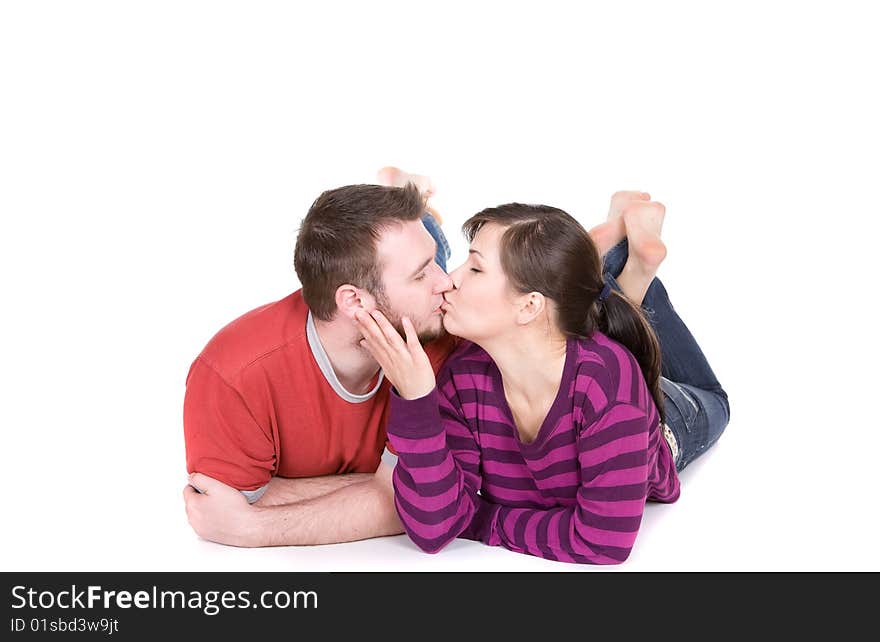 Young loving couple together on white background. Young loving couple together on white background