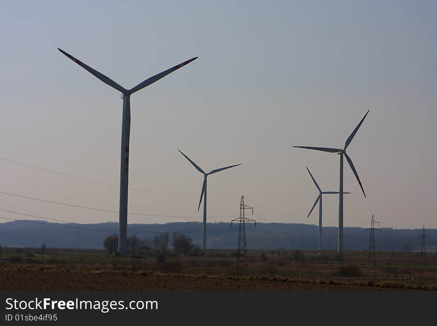 Wind turbines. Energy. Beautiful meadow