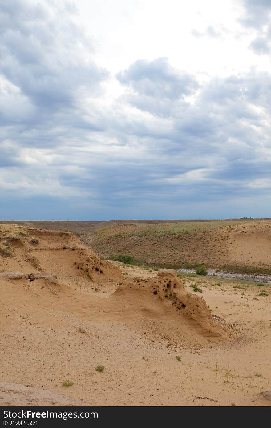 Desert, sky, clouds and sand