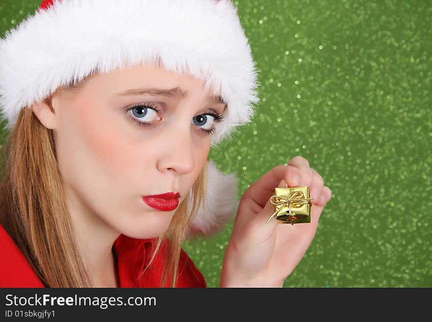 Teenager with red lips wearing a christmas hat. Teenager with red lips wearing a christmas hat