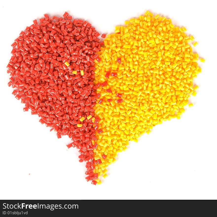 Plastic red heart isolated on white background