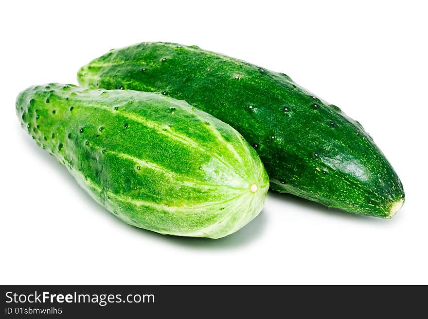 Green cucumbers isolated on white background