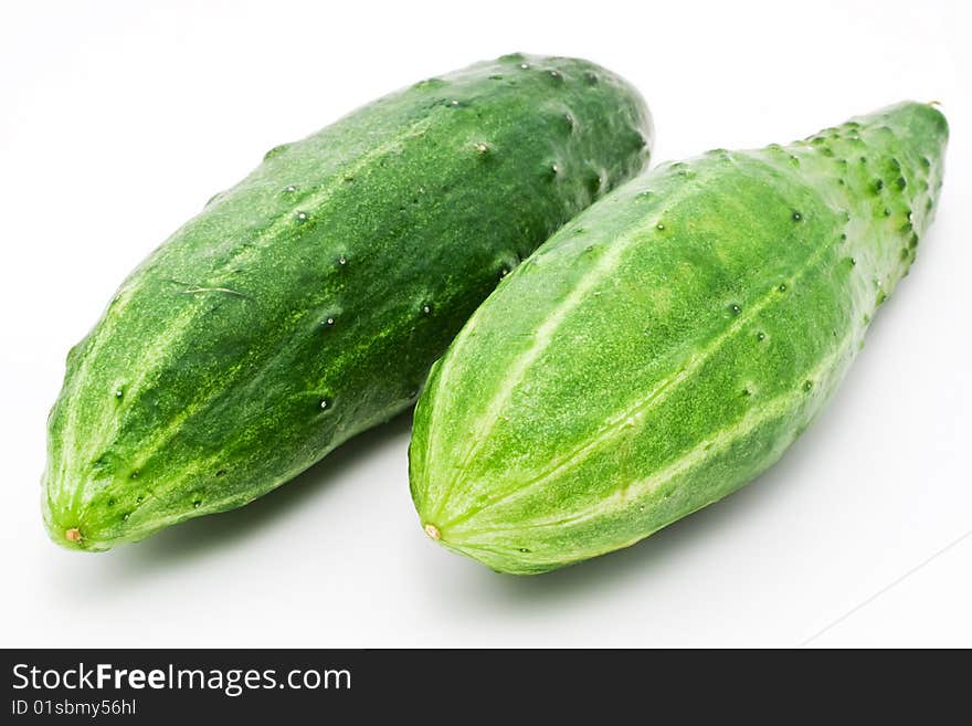 Green cucumbers isolated on white backgroun