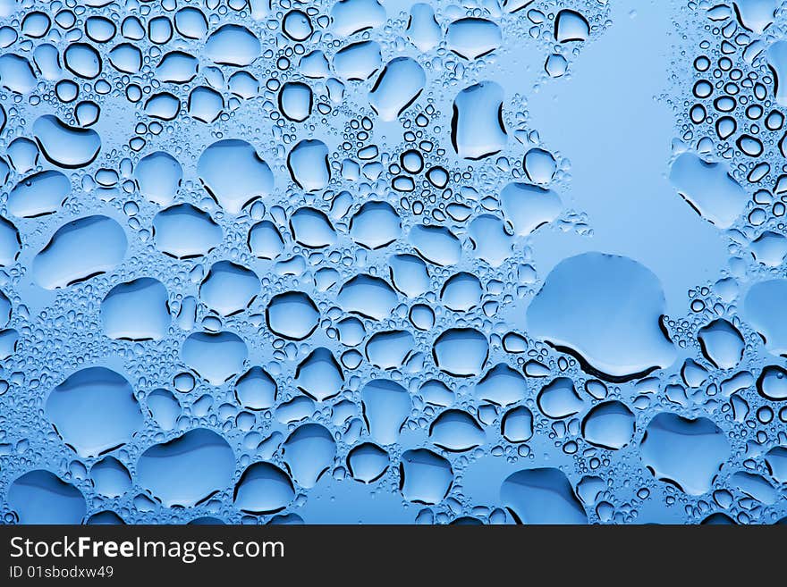 Abstract blue water drops background