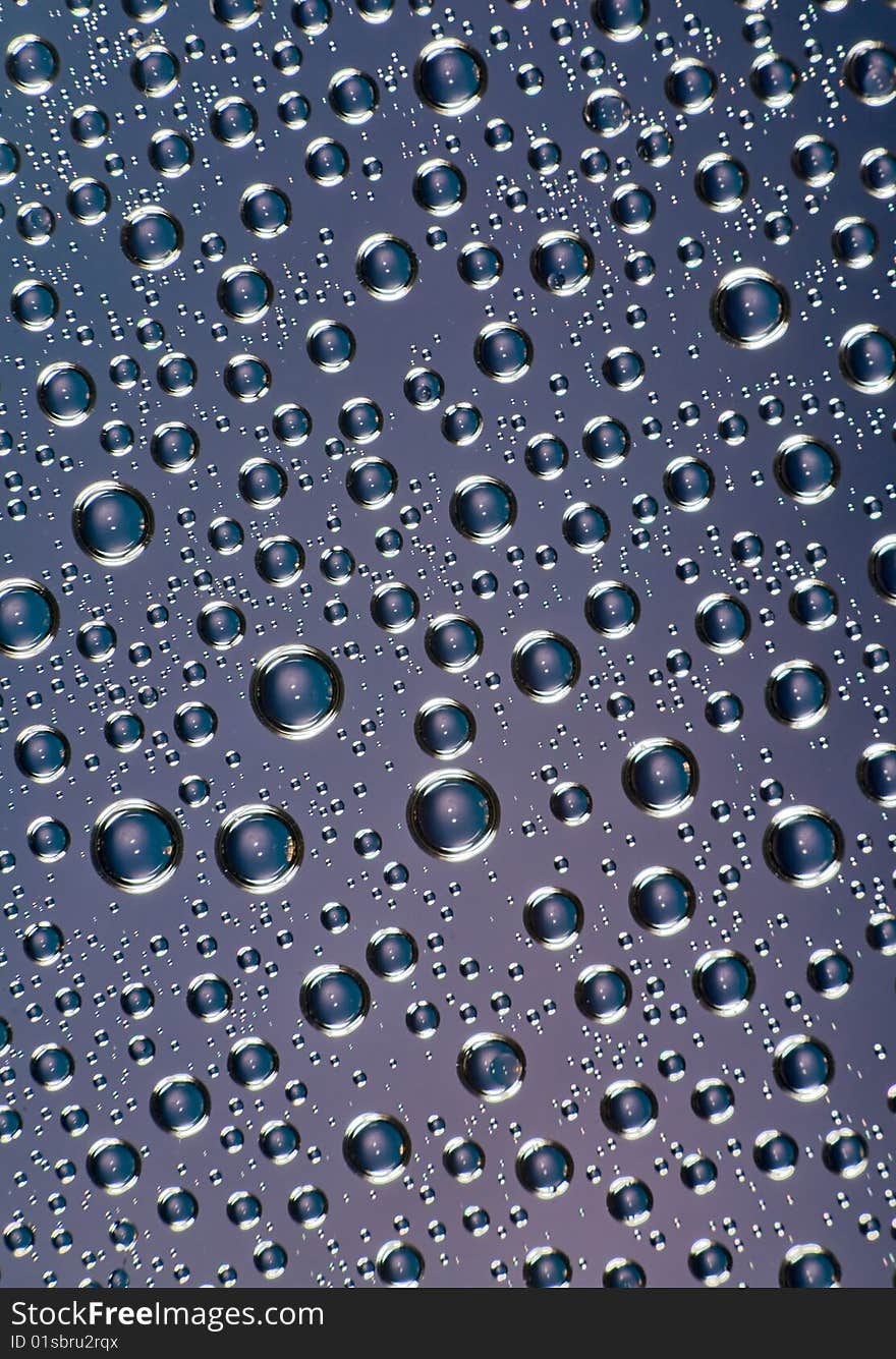 A lot of drops on blue background. A lot of drops on blue background