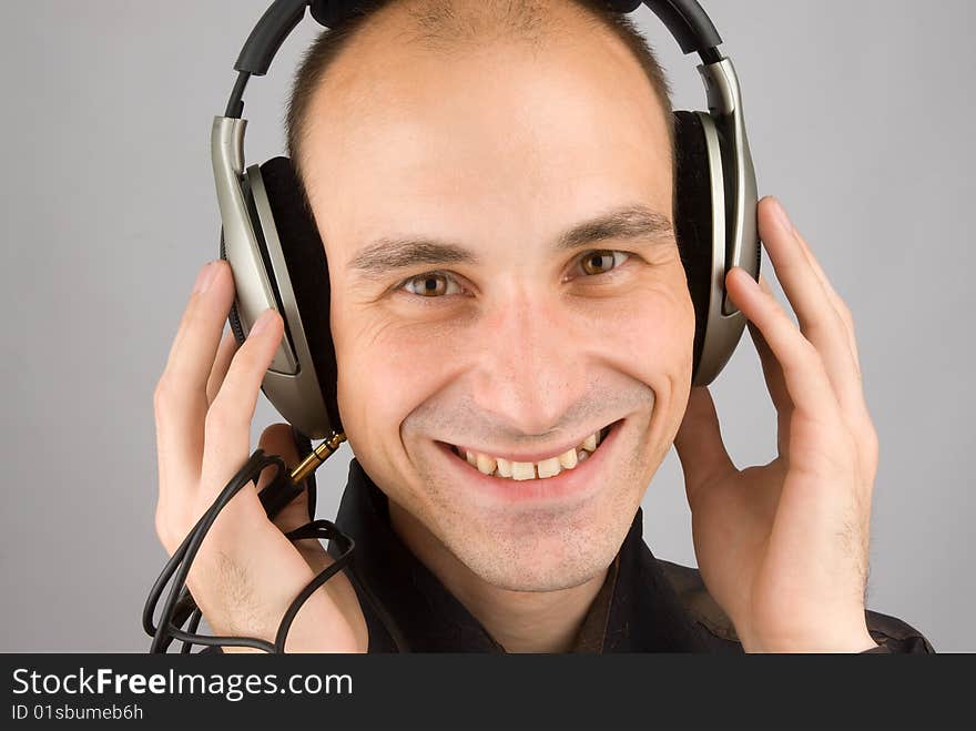 Man listening music in headphones