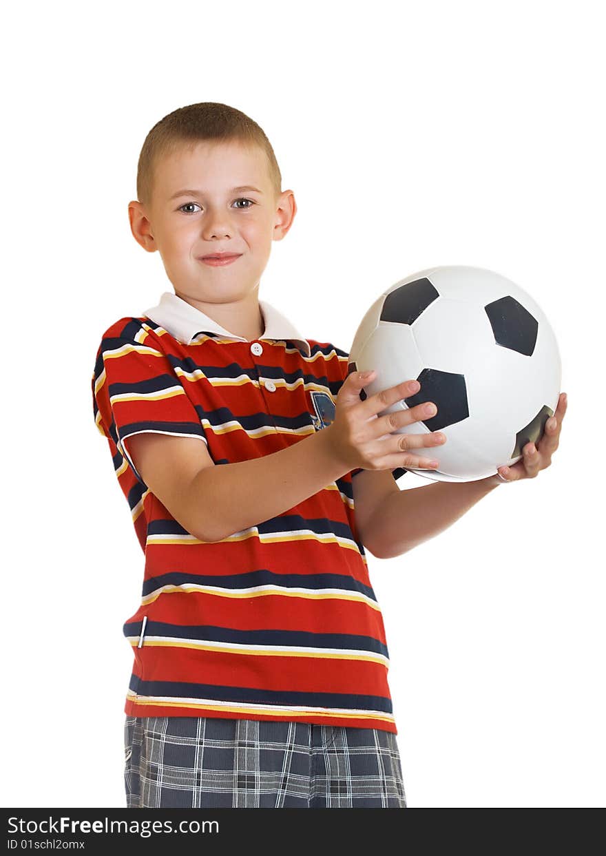 Young boy holding football in his hand. Young boy holding football in his hand