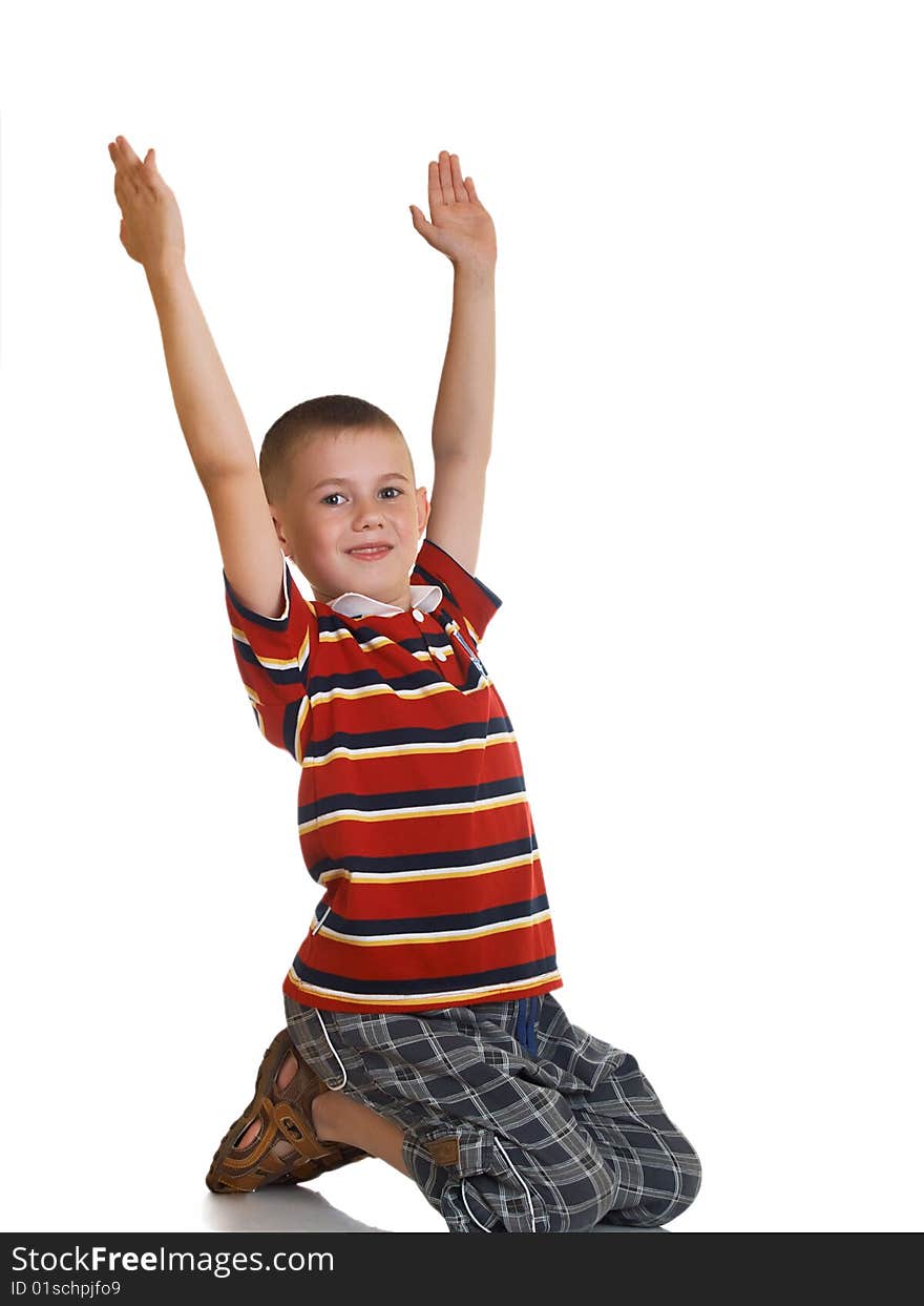 The boy shows gestures by two hands. The boy shows gestures by two hands