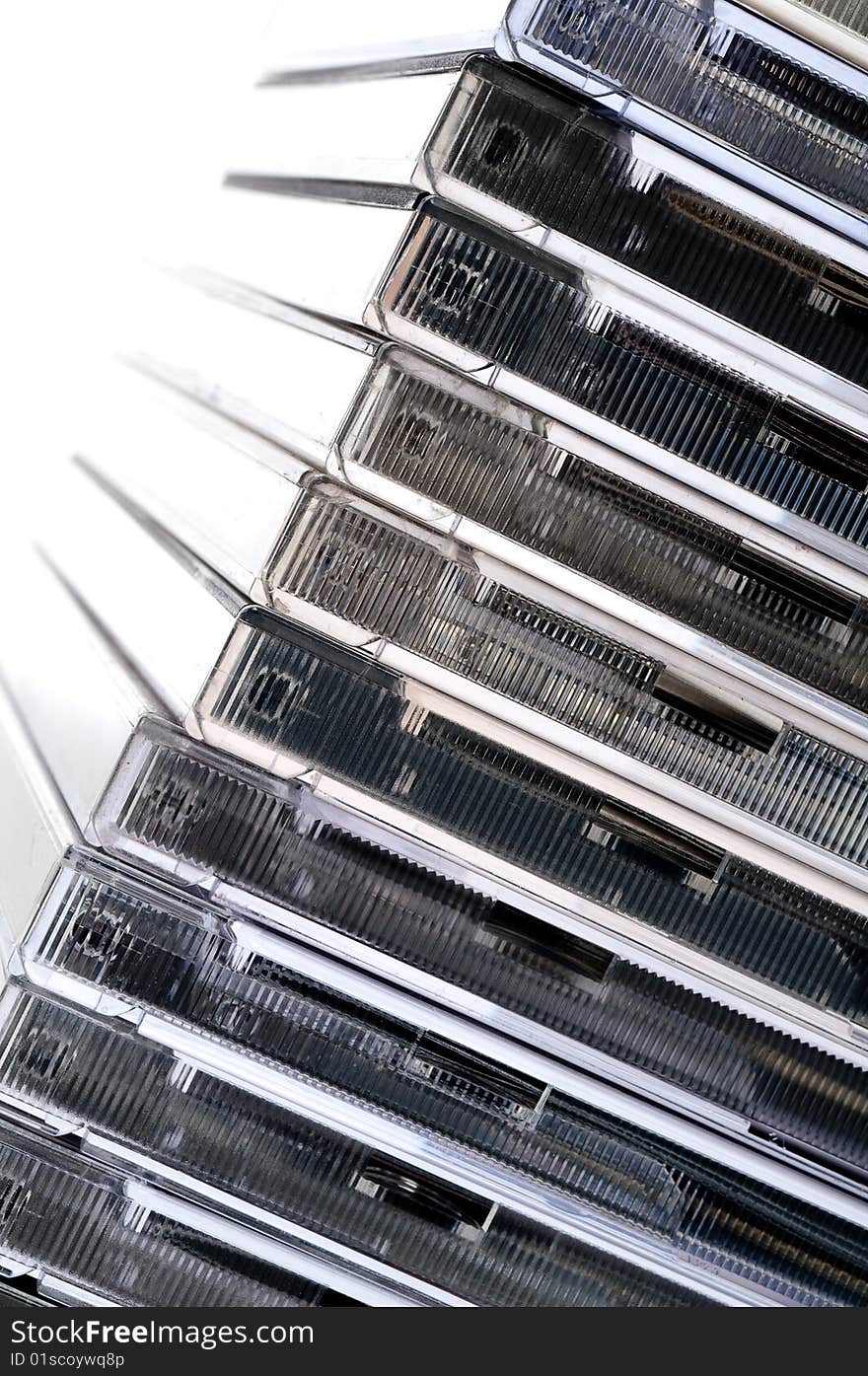 A tilted view of a stack of CDs