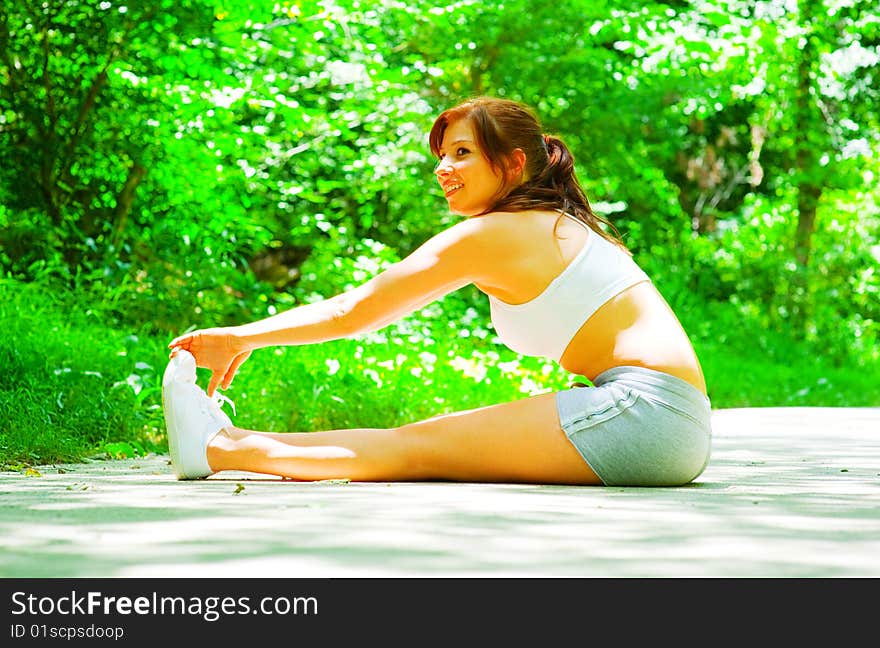 Woman Runner In The Woods