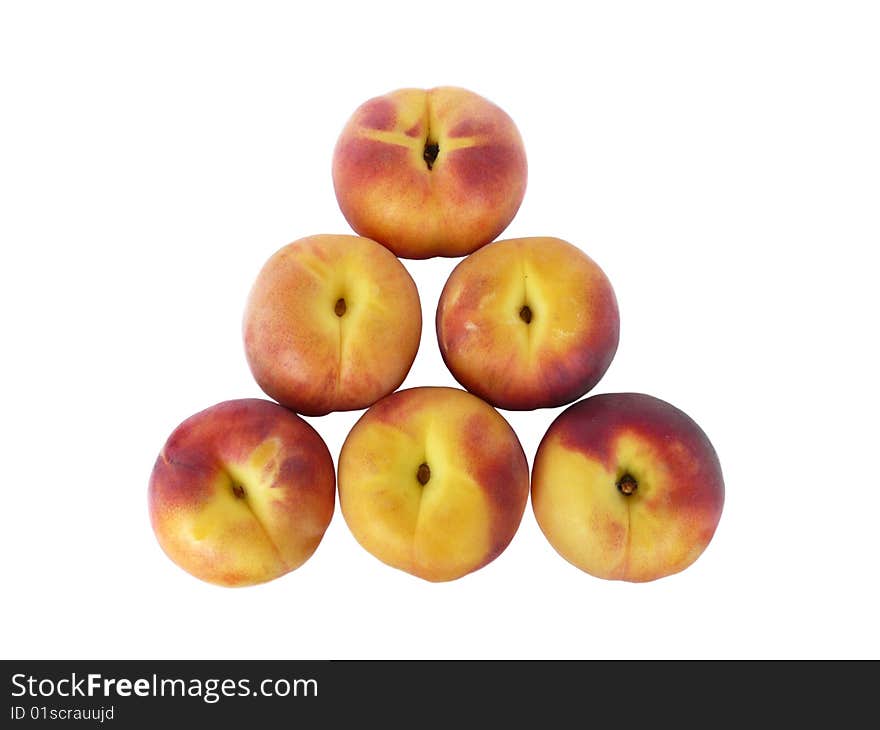 Pyramid from peaches, isolated over white background (up view)