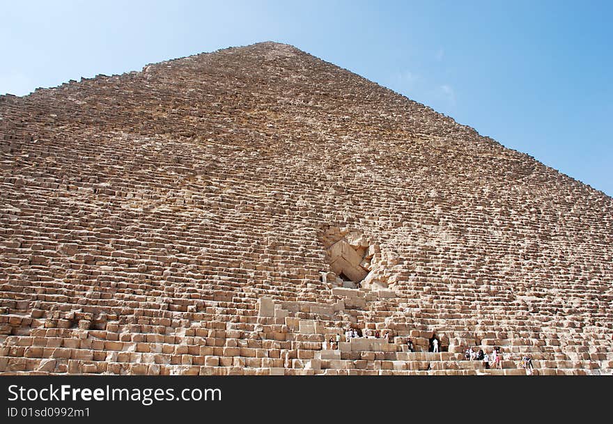 Great egyptian pyramid and blue sky