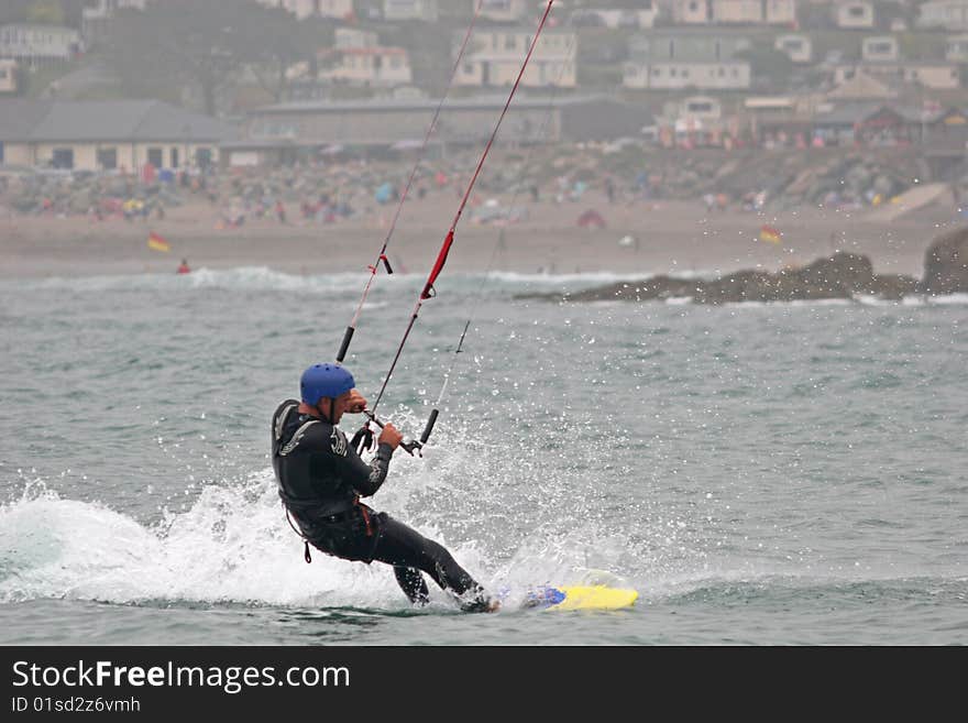 Kitesurfer surfing on hydrofoil board