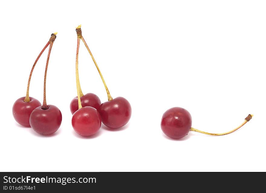 Ripe cherries isolated on white