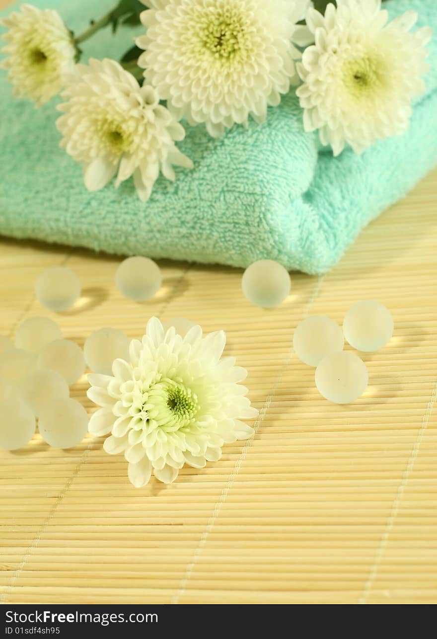 Spa composition. Towel, flowers and decorative balls