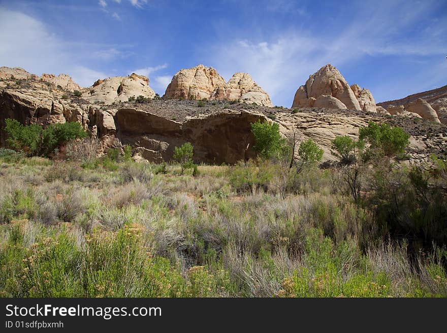 View of the red rock formations in Capitol Reef National Park with blue sky�s and clouds