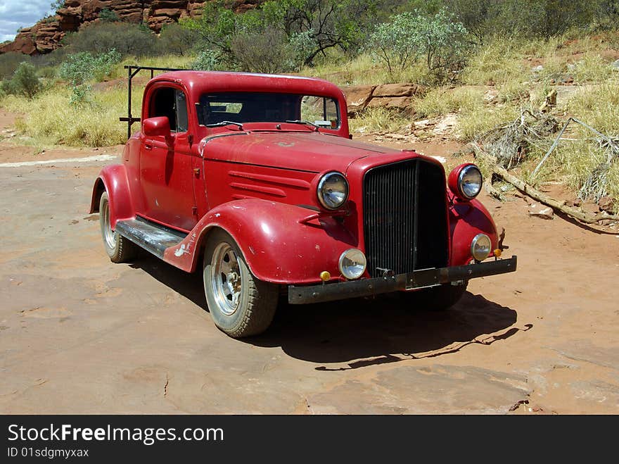 Old red classic car in Australia.