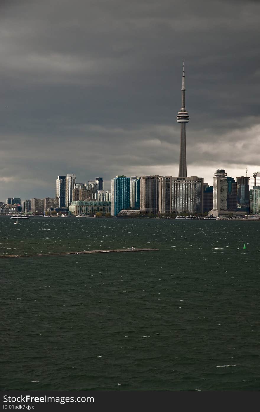 A rain storm is darkening the cityscape of Toronto. 
Seen from an elevated point at the cruise terminal. A rain storm is darkening the cityscape of Toronto. 
Seen from an elevated point at the cruise terminal