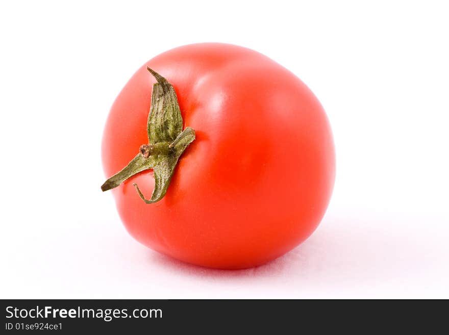 Red tomato on a white background