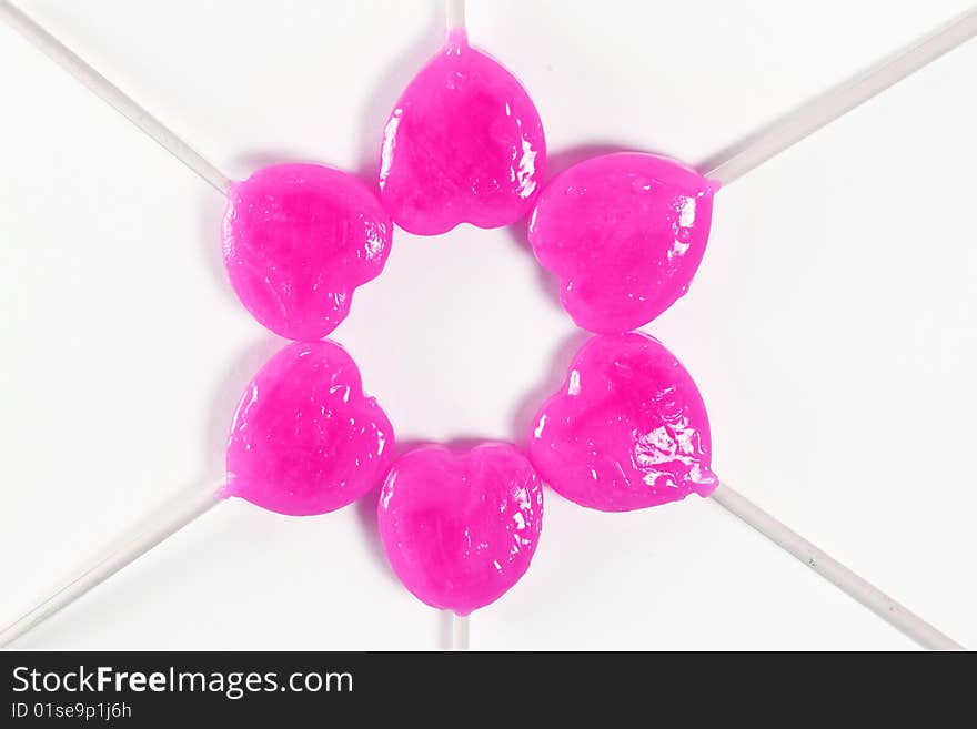 Star heart pink lollipops isolated