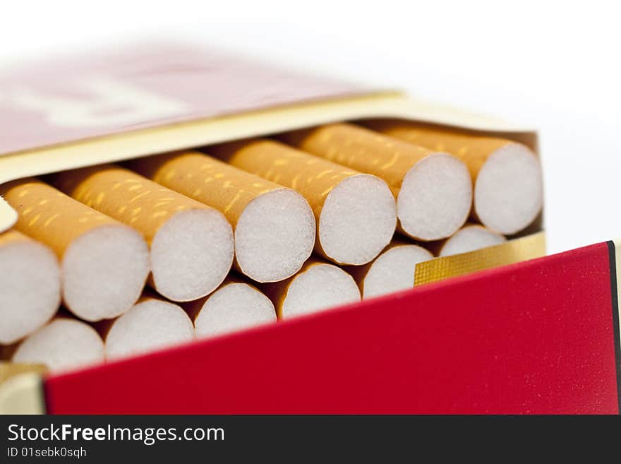 Single or pack of cigarettes with white background